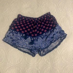 Colorful linen shorts with elastic waist, size S.